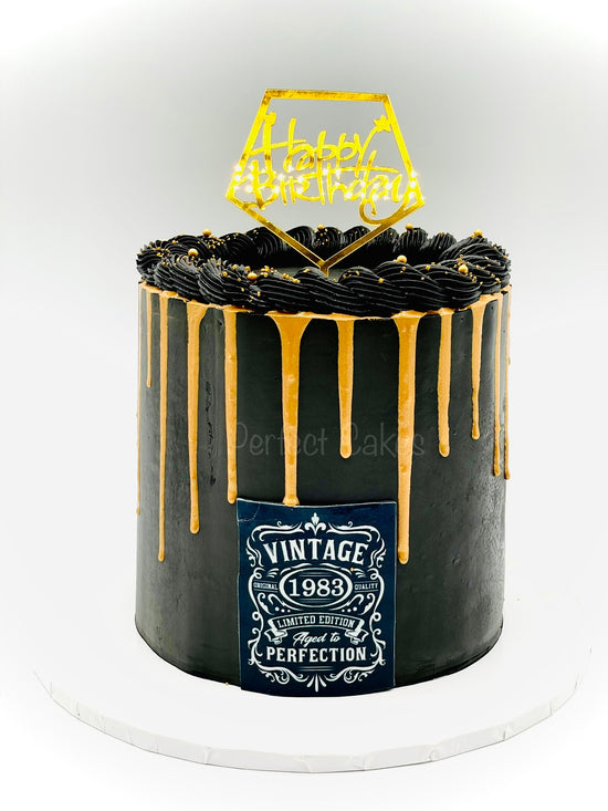 Aged to Perfection Black and Gold Cake