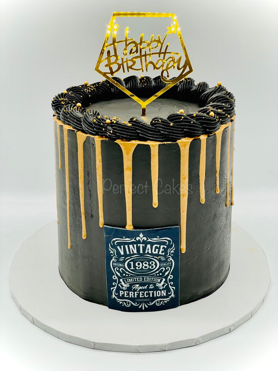 Aged to Perfection Black and Gold Cake