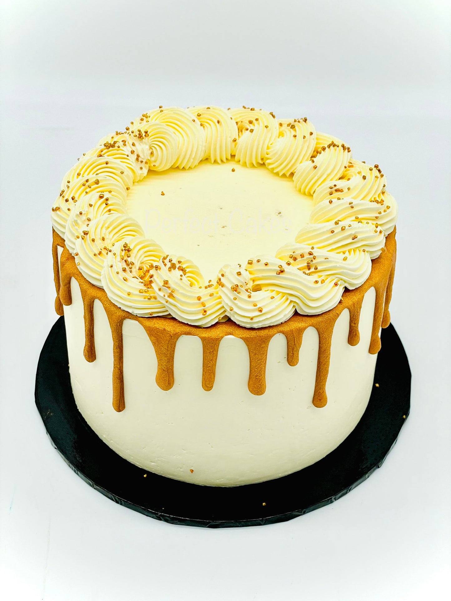 White and Gold Drip Cake