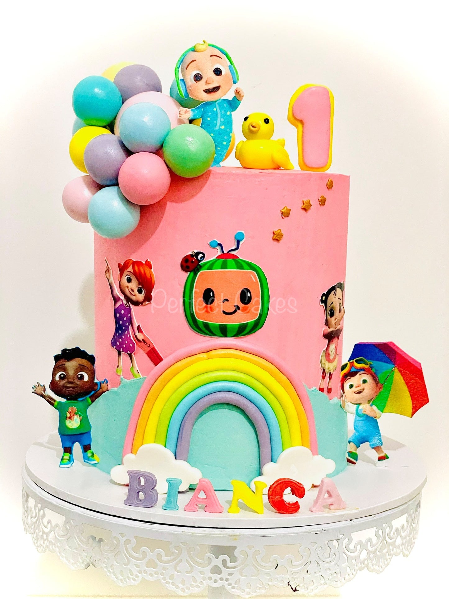 Cute cocomelon cake for a first birthday! Made in a rainbow sponge! Swipe  to see the cut, its always so satisfying!… | Instagram